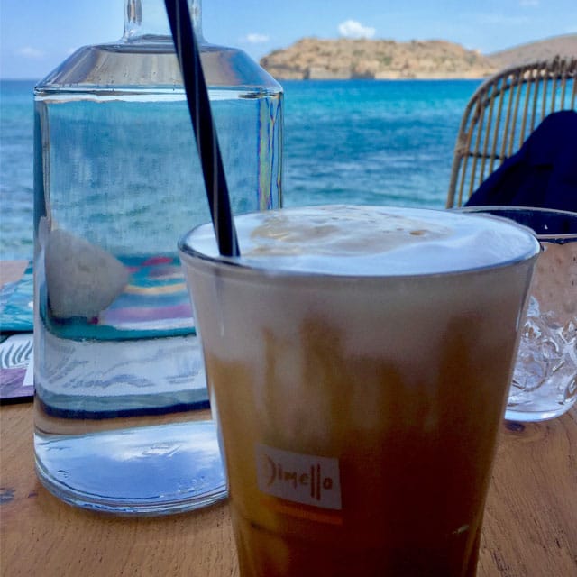 A smooth and creamy espresso freddo, dark and heady at the bottom of the glass with the espresso sinking slowly, and the foamy milk still rising to the top with glistening ice cubes connecting the two together. It's the drink of summer in Greece, you start and end your time there with one; one to greet your warmly on your return to paradise, the other is a lover's farewell caress that calls to you long after your plane has departed.
